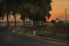 Sunset across the road - Tuscany Stock Image Sunset across the road - Tuscany Stock Image