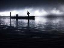 Asia. Sunset, twilight moonlight, clouds - Boat with asian people - Ocean, river landscape - Hanzhong, Shaanxi, China Stock Photos Asia. Sunset, twilight moonlight, clouds - Boat with asian people - Ocean, river landscape - Hanzhong, Shaanxi, China Stock Photos