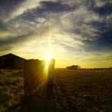 Sunset with dramatic sky over a farmer's field Royalty Free Stock Photo Sunset with dramatic sky over a farmer's field Royalty Free Stock Photo