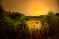 Sunset Over A River Royalty Free Stock Photos