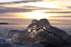 Sunset Over Frozen Lake Royalty Free Stock Photos