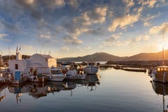 Sunset over the traditional fishing village of Naousa on Paros, Cyclades Royalty Free Stock Photos Sunset over the traditional fishing village of Naousa on Paros, Cyclades Royalty Free Stock Photos