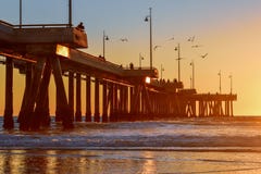 Sunset over Venice Beach Pier in Los Angeles, California - Birds stock photos Sunset over Venice Beach Pier in Los Angeles, California - Birds stock photos