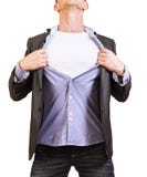 Super héroe. Hombre joven que rasga su camisa apagado aislada encendido fotografía de archivo libre de regalías Super héroe. Hombre joven que rasga su camisa apagado aislada encendido fotografía de archivo libre de regalías