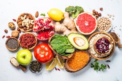 Superfoods en el fondo blanco Nutrición sana del vegano fotografía de archivo libre de regalías Superfoods en el fondo blanco Nutrición sana del vegano fotografía de archivo libre de regalías