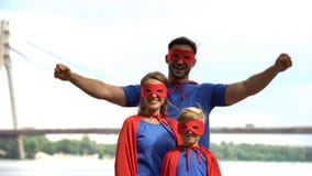 Superhero family having fun outdoors, entertainment center, costume b-day party royalty free stock image Superhero family having fun outdoors, entertainment center, costume b-day party royalty free stock image