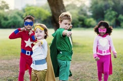 Superheroes Cheerful Kids Expressing Positivity Concept stock images Superheroes Cheerful Kids Expressing Positivity Concept stock images