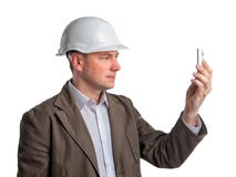 Supervisor da construção que faz fotos do telefone fotos de stock royalty free Supervisor da construção que faz fotos do telefone fotos de stock royalty free