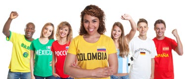 Suporte do futebol de Colômbia com os fãs de outros países imagens de stock Suporte do futebol de Colômbia com os fãs de outros países imagens de stock