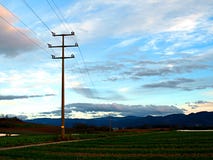 Support of power lines in the evening royalty free stock photo Support of power lines in the evening royalty free stock photo