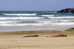 Surf Boards - Yellow Sand Beach - Small Waves - Sports Royalty Free Stock Photography Surf Boards - Yellow Sand Beach - Small Waves - Sports Royalty Free Stock Photography