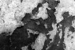 Surface with peeling off flakes of tar. Black and white texture. royalty free stock photo Surface with peeling off flakes of tar. Black and white texture. royalty free stock photo