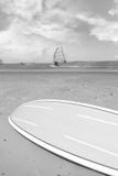 Surfboard On Beach With Surfers Stock Photo Surfboard On Beach With Surfers Stock Photo