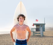 Surfer boy teen with surfboard in Santa Monica stock photography Surfer boy teen with surfboard in Santa Monica stock photography