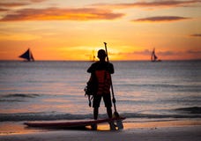 Surfer standing next surfboard stock photo Surfer standing next surfboard stock photo