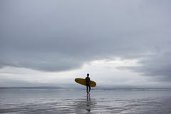 Surfer With Surfboard Walking Towards Sea On Beach Stock Images Surfer With Surfboard Walking Towards Sea On Beach Stock Images