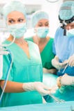Surgeon doctors working in operation theater stock photo Surgeon doctors working in operation theater stock photo