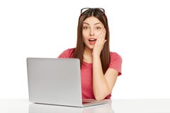 Surprised girl with laptop royalty free stock images Surprised girl with laptop royalty free stock images