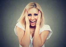 Surprised young cute woman smiling in studio stock image Surprised young cute woman smiling in studio stock image