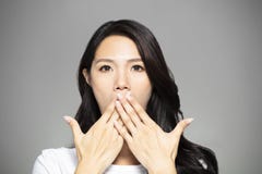 Surprised young woman hands coverd the mouth royalty free stock photography Surprised young woman hands coverd the mouth royalty free stock photography