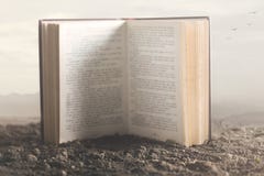 Surreal image of a giant book open in the middle of nature stock photos Surreal image of a giant book open in the middle of nature stock photos