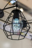 Suspended luminaire with LED bulb lamp. Close-up. Comfort in home stock photography Suspended luminaire with LED bulb lamp. Close-up. Comfort in home stock photography
