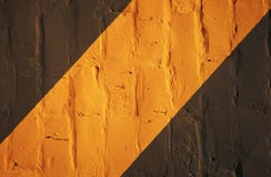 Svart orange väggbakgrund Grunge väggbakgrund royaltyfri bild Svart orange väggbakgrund Grunge väggbakgrund royaltyfri bild