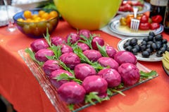 Svyokolky - traditional Russian dish consisting of eggs topped by mayo and decorated in beet shapes and colors stock photography Svyokolky - traditional Russian dish consisting of eggs topped by mayo and decorated in beet shapes and colors stock photography
