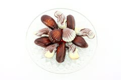 Sweet Chocolate Shellfish On Glass Plate Royalty Free Stock Photography Sweet Chocolate Shellfish On Glass Plate Royalty Free Stock Photography