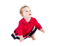 Sweet little baby girl in a red dress learning to crawl royalty free stock image Sweet little baby girl in a red dress learning to crawl royalty free stock image
