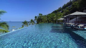 Swiming pool in luxury resort with sea view stock images Swiming pool in luxury resort with sea view stock images