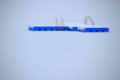 Snow-covered floating platform in frozen lake royalty free stock photography Snow-covered floating platform in frozen lake royalty free stock photography