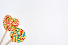 Swirl rainbow lollipop candy on white background Stock Images Swirl rainbow lollipop candy on white background Stock Images