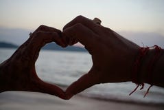 Symbol of love Couple hands making heart shape. royalty free stock image Symbol of love Couple hands making heart shape. royalty free stock image
