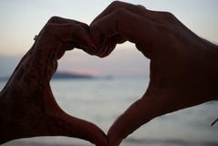 Symbol of love Couple hands making heart shape. stock photography Symbol of love Couple hands making heart shape. stock photography
