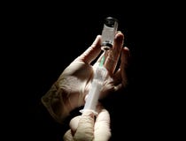 Syringe That Is Being Filled With Vaccine Royalty Free Stock Image Syringe That Is Being Filled With Vaccine Royalty Free Stock Image