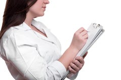 Szczegół kobiety lekarki writing na schowku zdjęcia stock Szczegół kobiety lekarki writing na schowku zdjęcia stock