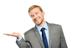 Szczęśliwego młodego biznesmena seansu pusty copyspace na bielu obraz royalty free Szczęśliwego młodego biznesmena seansu pusty copyspace na bielu obraz royalty free