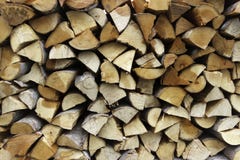 Séchez la texture coupée de backround de rondins de bois de chauffage images libres de droits Séchez la texture coupée de backround de rondins de bois de chauffage images libres de droits