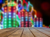 Table on Illuminated background of city events, fairs, folk festivals. royalty free stock photos Table on Illuminated background of city events, fairs, folk festivals. royalty free stock photos