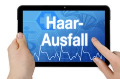 Tablet computer with the german word for hair loss - Haarausfall royalty free stock photo Tablet computer with the german word for hair loss - Haarausfall royalty free stock photo