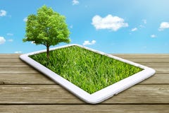 Tablet Computer With Green Grass And Tree Royalty Free Stock Images Tablet Computer With Green Grass And Tree Royalty Free Stock Images