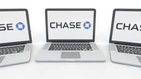 Taccuini con il logo di JPMorgan Chase Bank sullo schermo Rappresentazione concettuale dell'editoriale 3D di tecnologie informati royalty illustrazione gratis Taccuini con il logo di JPMorgan Chase Bank sullo schermo Rappresentazione concettuale dell'editoriale 3D di tecnologie informati royalty illustrazione gratis