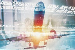 Take off of an aircraft with double exposure of airport stock image Take off of an aircraft with double exposure of airport stock image