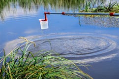 Take samples of water for laboratory testing. The concept - analysis of water purity, environment, ecology. stock image Take samples of water for laboratory testing. The concept - analysis of water purity, environment, ecology. stock image
