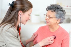 Taking old lady`s heartbeat royalty free stock photos Taking old lady`s heartbeat royalty free stock photos