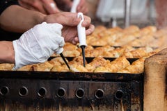 Takoyaki es snacks japoneses m?s famosos fotografía de archivo libre de regalías Takoyaki es snacks japoneses m?s famosos fotografía de archivo libre de regalías