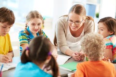 Talking to pupils stock image Talking to pupils stock image