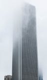 Tall Building Into Fog Royalty Free Stock Photos