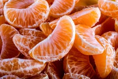 Tangerine oder Mandarinesegmente zogen nah herauf Hintergrundbeschaffenheit ab Lizenzfreies Stockbild Tangerine oder Mandarinesegmente zogen nah herauf Hintergrundbeschaffenheit ab Lizenzfreies Stockbild